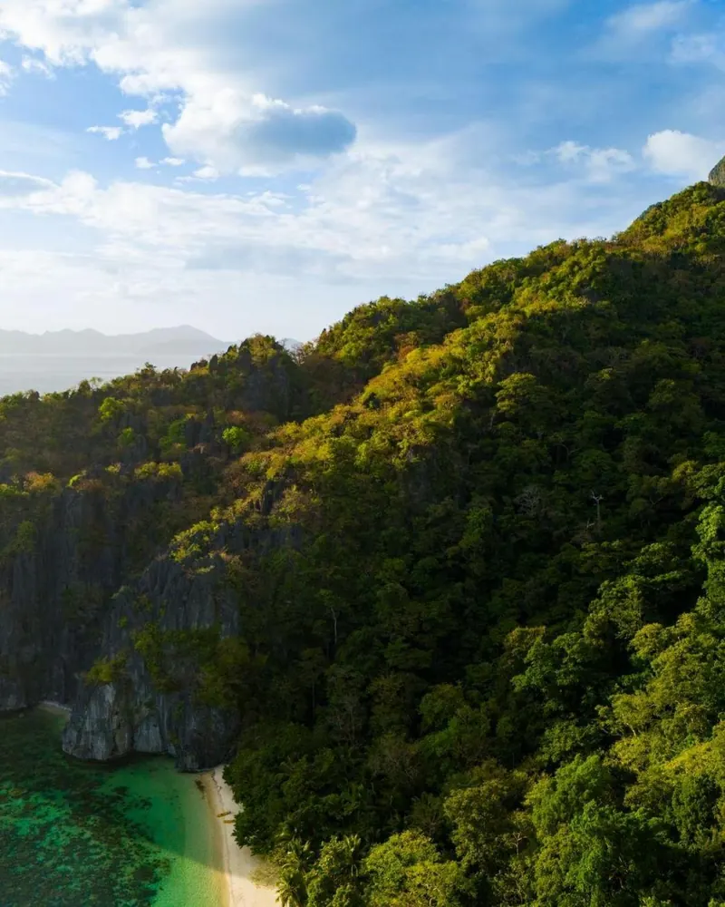 Karst islets scattered across the bay near El Nido