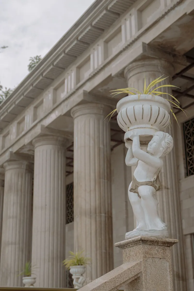 Granite columns and a classical statue at the Temple of Leah in Cebu City
